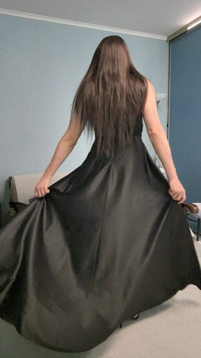 Spinning in a black dress