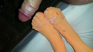 My huge load on my wifes nylon orange feet