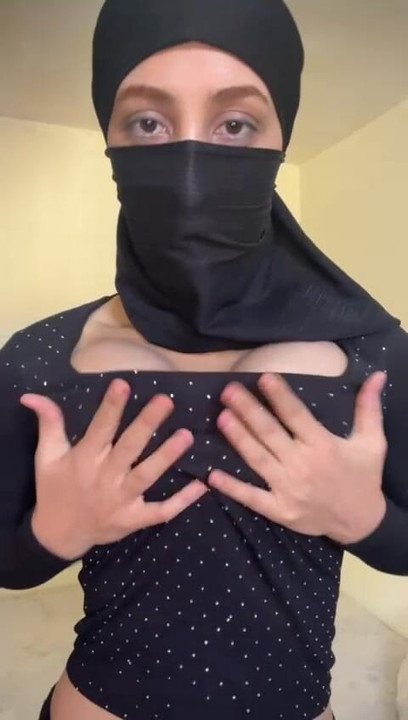 Arab Girl in Hijab Moans Softly While Squeezing Her Own Big Boobs