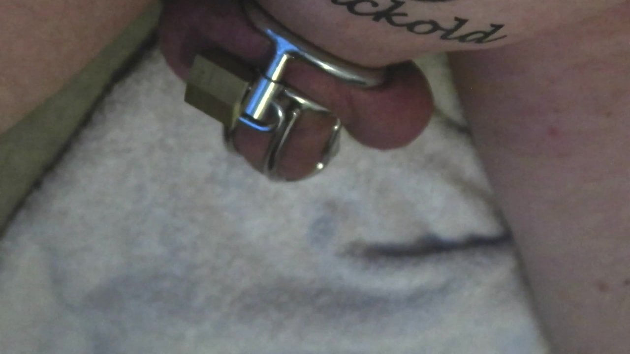 Slapping my caged cock and balls
