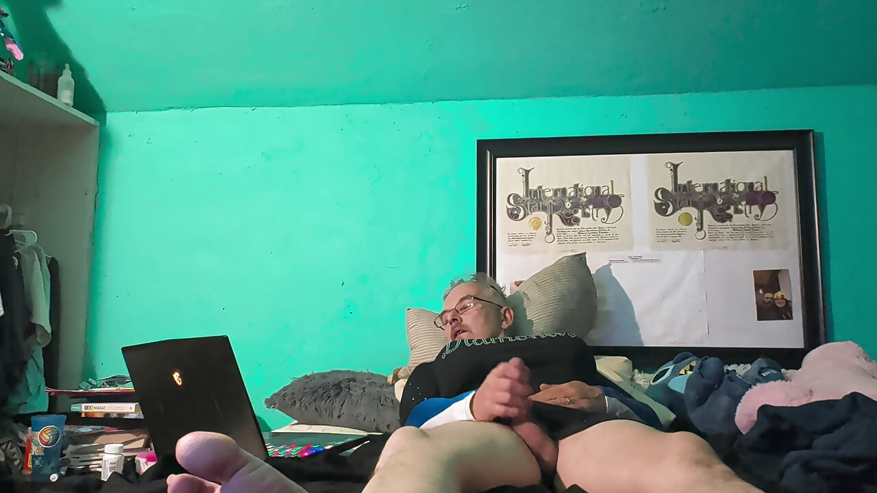 Masturbating in wife's cheerleading uniform.
