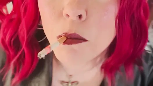 Your Mistress Tina Snua dressed In Leather Chain Smoking 2 Cork Cigarettes