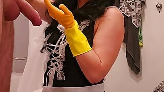 Chubby Milf Maid Bound Ember, gives handjob to hotel guest in rubber gloves then takes a cumshot facial