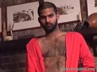 Bearded Hunk In The Red Outfit