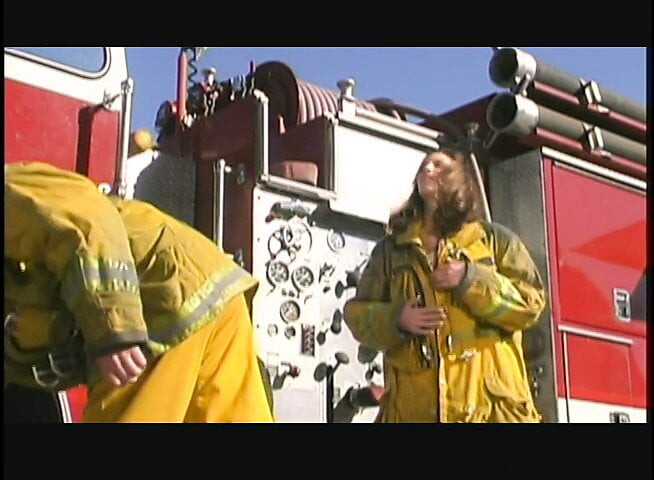 Busty luxurious brunette gets her hole drilled by fire man near the fire truck