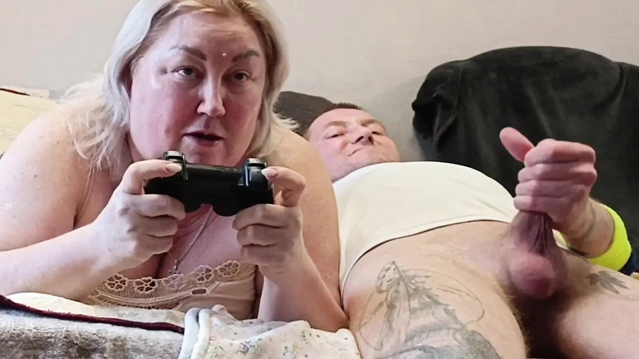 He interrupted his stepmom's game on the console, fucked her in her mouth and finished in it