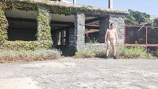 Boy completely naked near the sea
