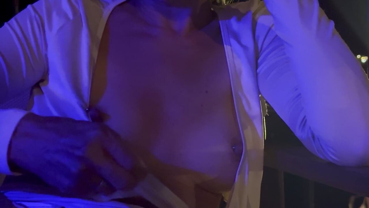 My beautiful breasts and pierced nipples are exposed in a night out bar by the sea