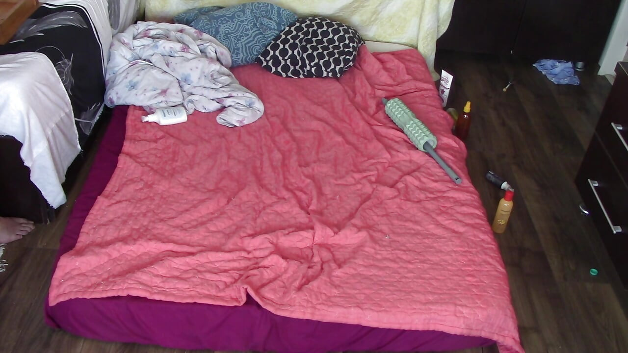 Foreplay in the bedroom with an amateur couple.