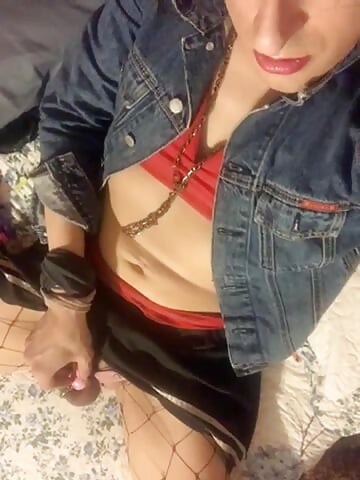 Cute Latina Transgirl in Fishnets & Red Heels Puts On Small Pink Leashed Chastity & Sucks Dildo, As Usual