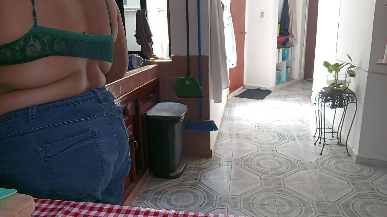 Mom in the kitchen in bralett