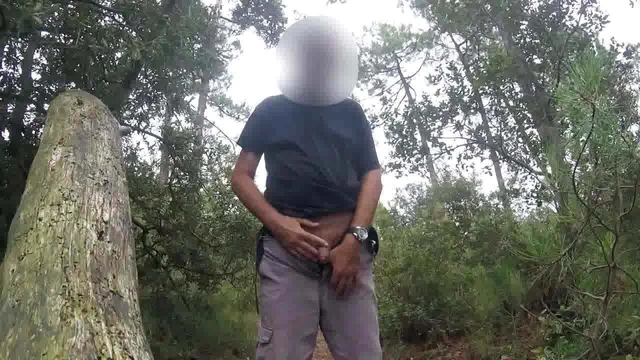 Pissing in the woods behind the beach
