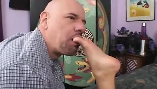 Cocksucker squirts then licks creampie on her toes