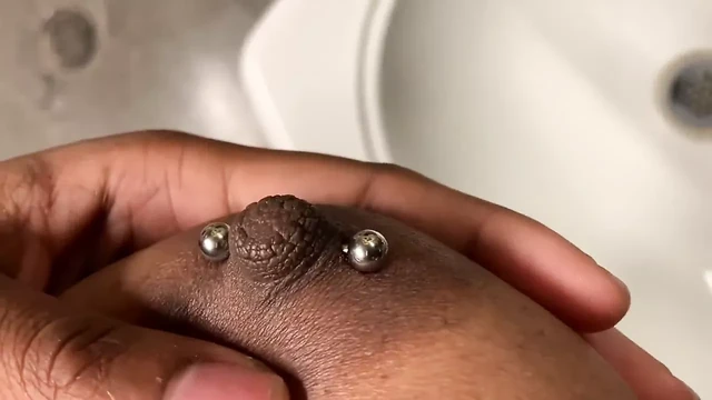 Black busty Youtuber gets nipples pierced