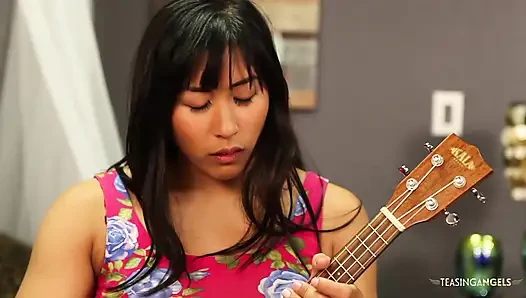 engaging in a sensuous physical encounter with her Asian lesbian companion