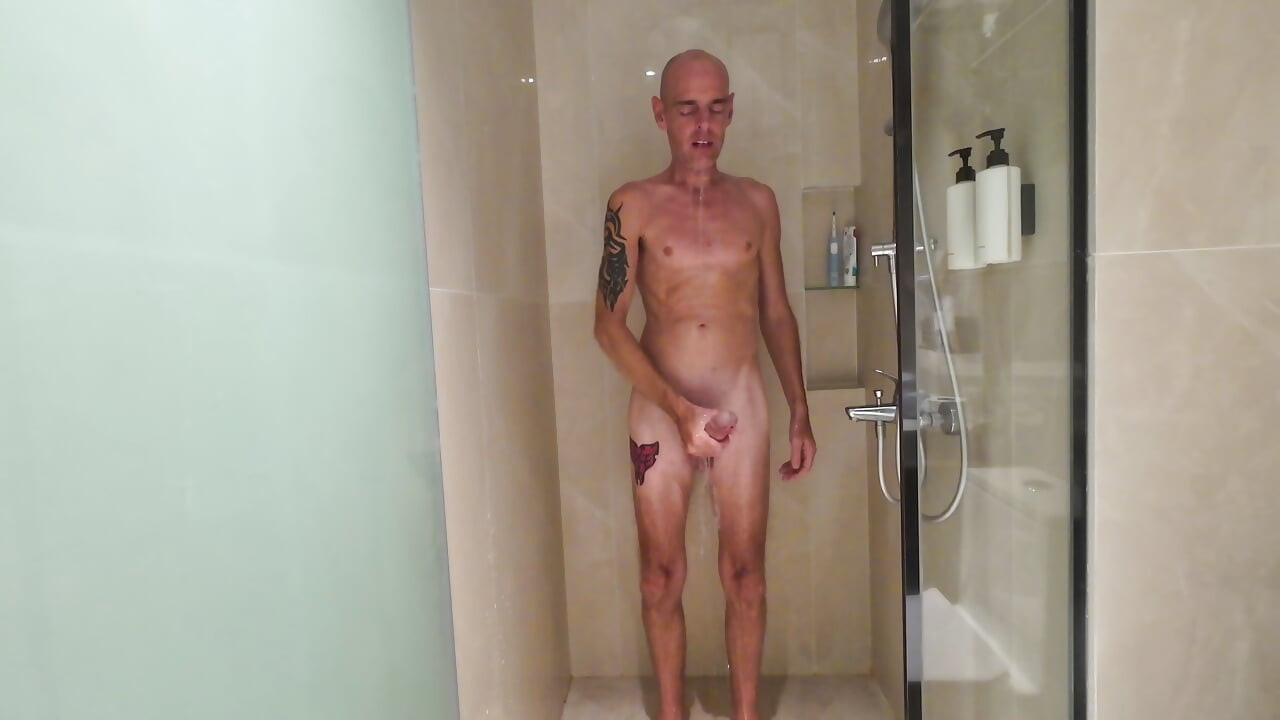 Perv on me as i have a shower and wash my big dick making it all soapy and slippery