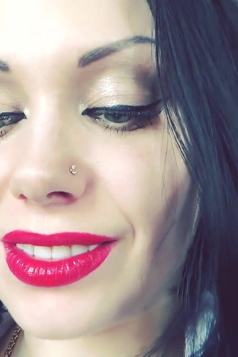 Luscious red lips tease