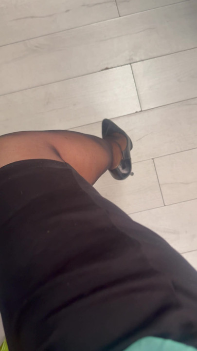 Wife teasing in nylons, high heels and short skirt