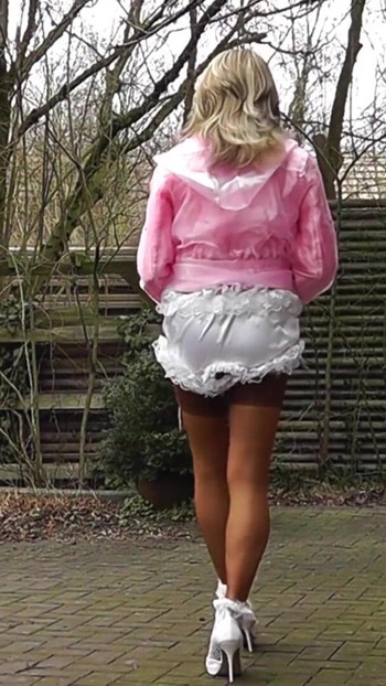 Key moment from "Wanking Sissy In Shiny Satin"