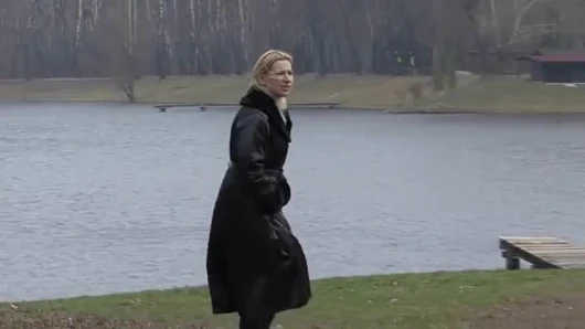 Bitch in leather pissing on a pier