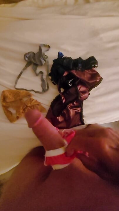 Sissy boy plays in satin panties.