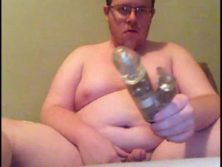 Fat faggot jerking after play with dildo