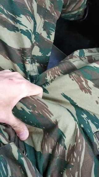 Grabbing bulge with no underwear in army car next to sergean