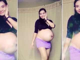 Dancing and Teasing Pregnant Babe