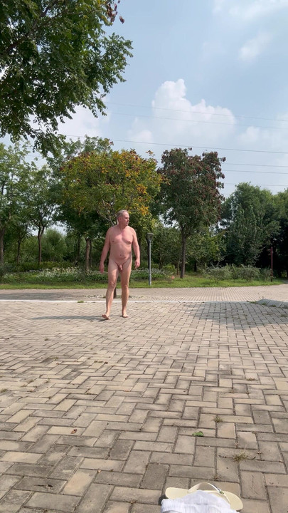 Jumping jack naked in public park