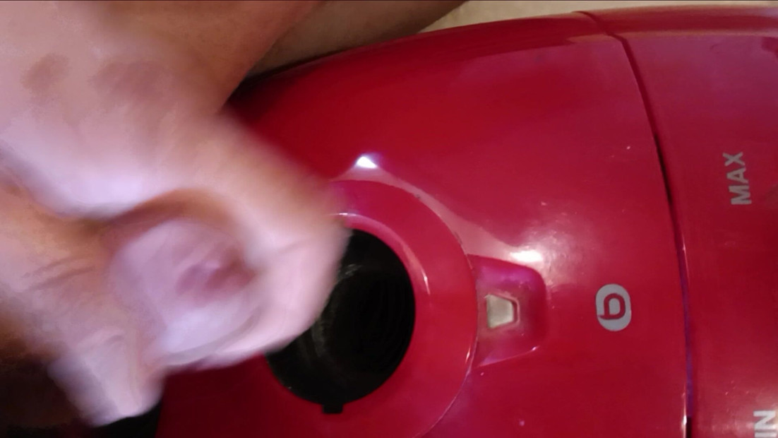 The lope bangs her vacuum cleaner