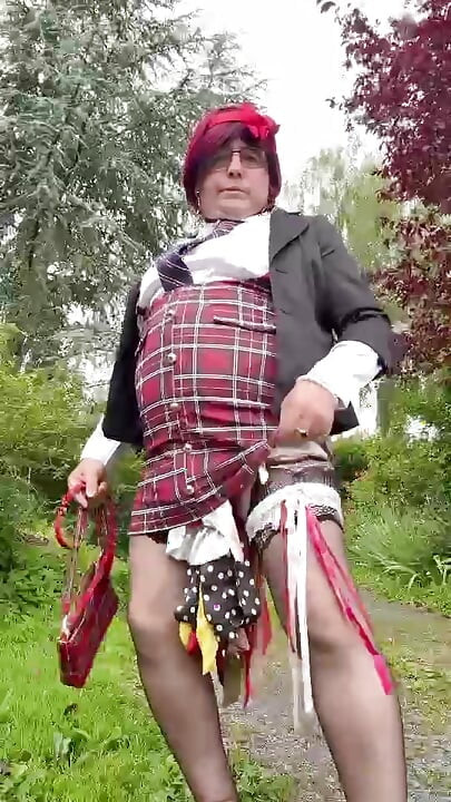 Dressed in a little plaid suspender skirt for an evening