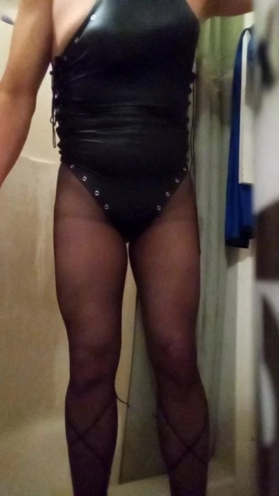 Black leather one piece and pantyhose