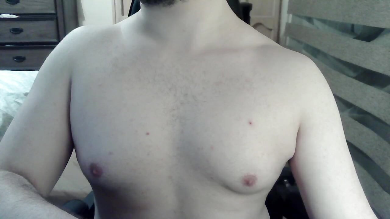 Hot camboy works his legs and nipples