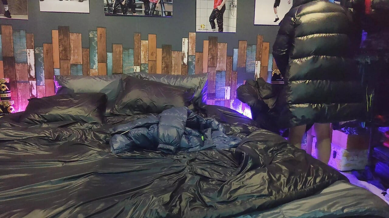 Cock Rubbing Down Jacket on Shiny Nylon Bed