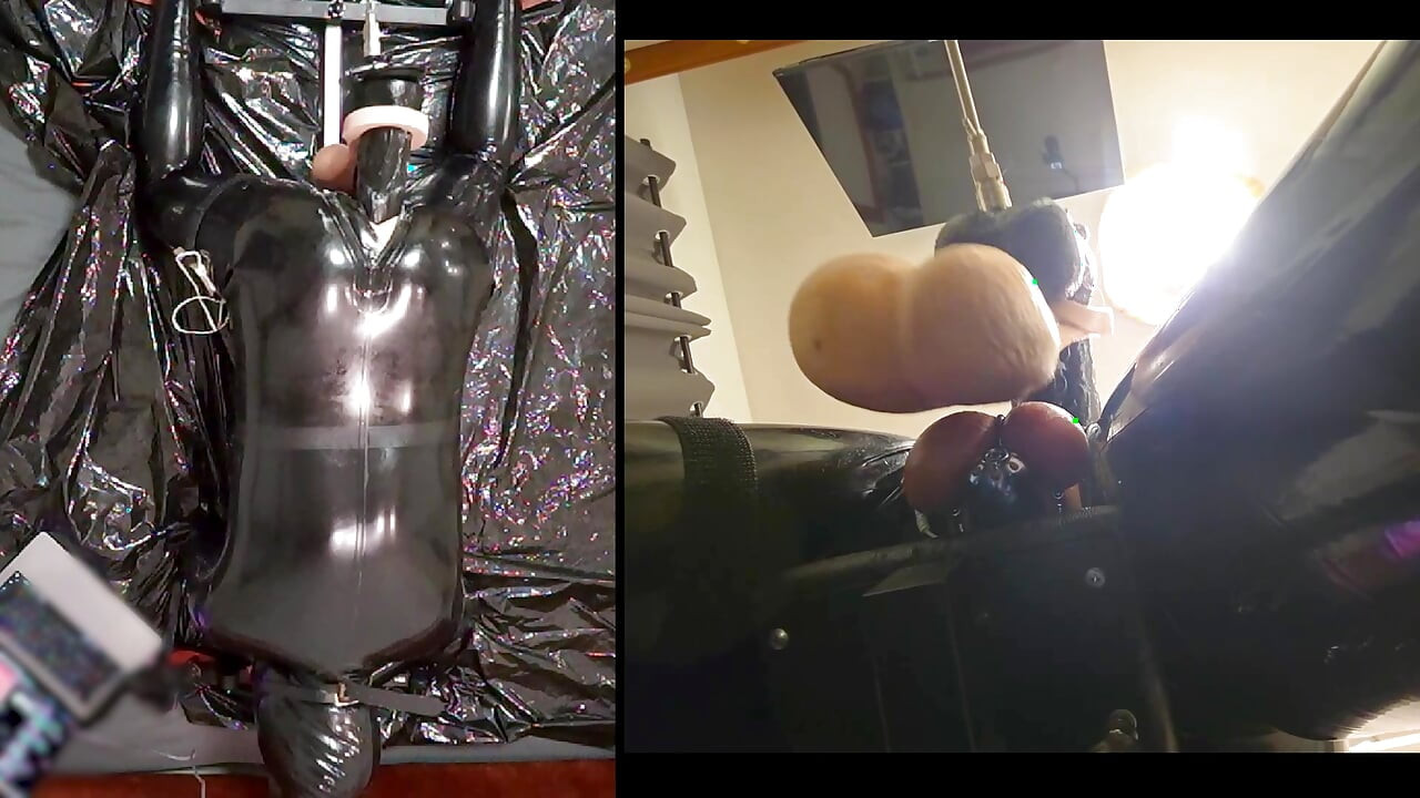Session in the pillory with Latex Catsuit, PA Chastity, Giant Didildo and Estim