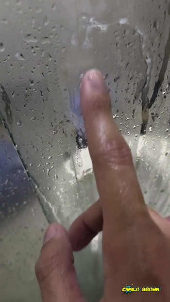 Powerful moment from "Camilo Brown Jerking His Big Uncut Cock in the Shower and Eating His Own Cum"