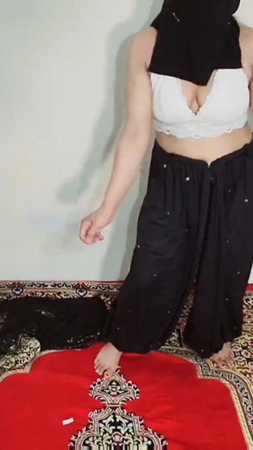 Arabic sexy hot girl wearing black hijab in house doing sensual dance, Desi Indian slut Amrozia shaking tits and ass on Arabic music | Clip 1