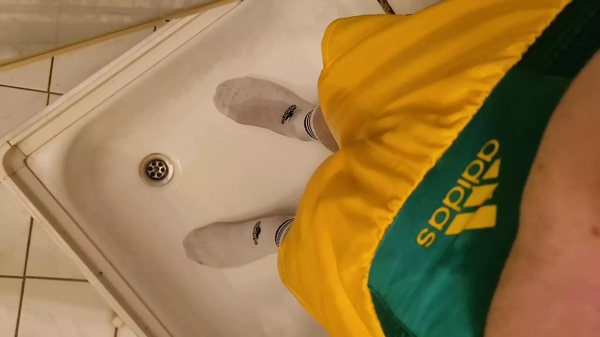 piss in yellow adidas boxer and white sox