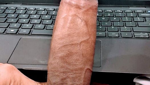 Watching porn on laptop and masturbating my big Indian cock