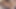 小柄なブロンドの女の子が複数のペニスに叩かれる