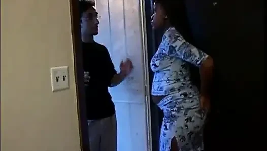 Guy is fucking pregnant black chick missionary style after licking her cunt