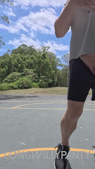Straight guy hanging out his uncut cock at the public space.