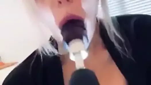 Bimbo blonde fucks her holes with a big power tool dildo