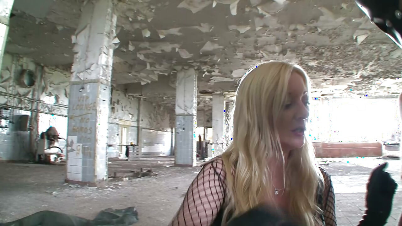 Two Latex Dommes Destroy Masked Slave in Abandoned Warehouse