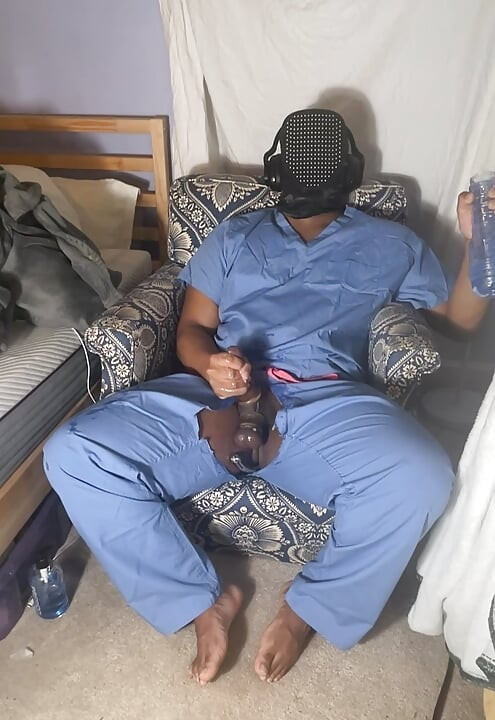 Man In Scrubs Jerking Out A Moaning Cumshot With Fleshlight