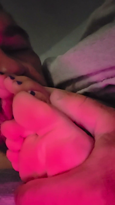 Sucking her toes while she watches a movie | Clip 1