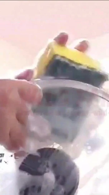 Emotional moment from "Indian Desi Maid with Big Tits Filmed while Washing Dishes"