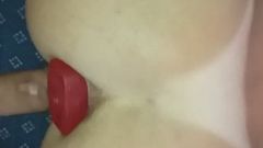 BIG RED PLUG IN THE ASS