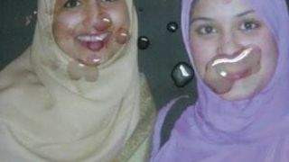 Gman kommt auf das Gesicht von zwei pakistanischen Mädchen im Hijab (Tribut)