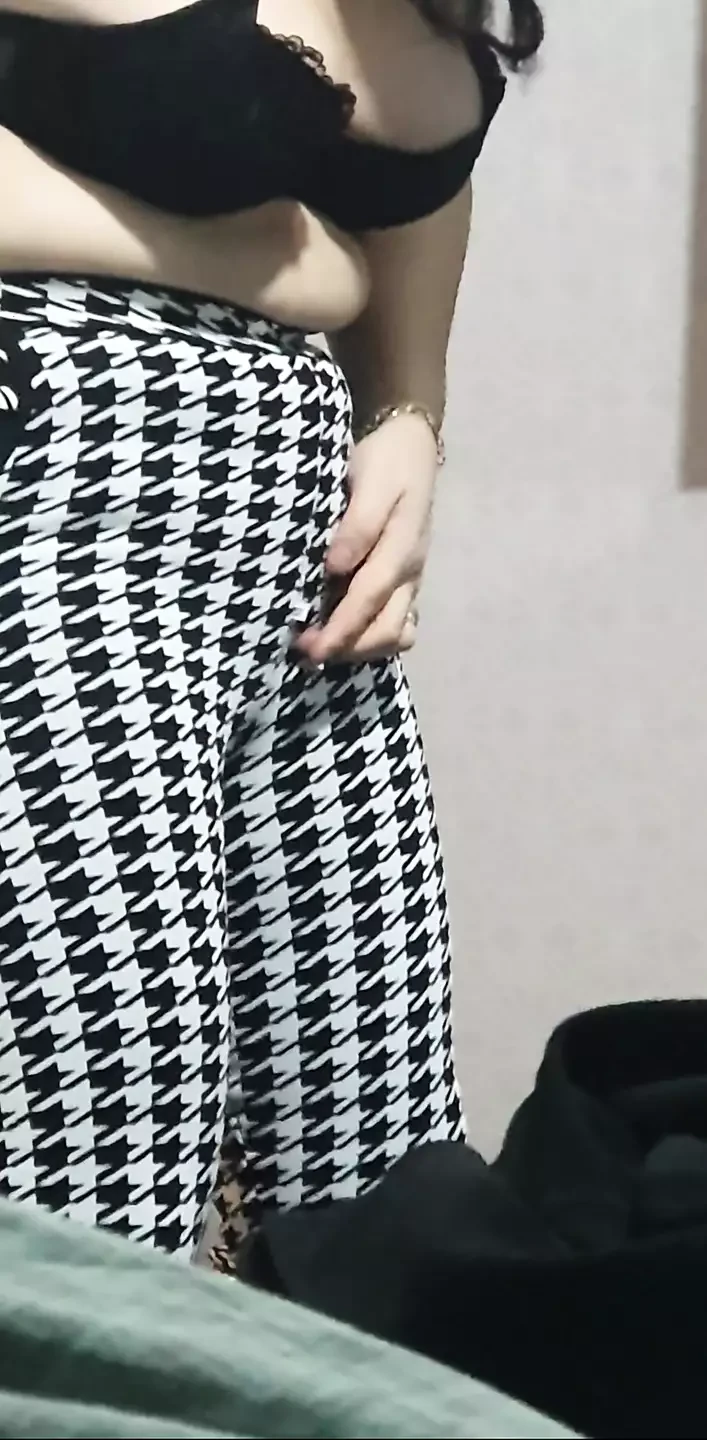 Step mom trying new suit in front of step son